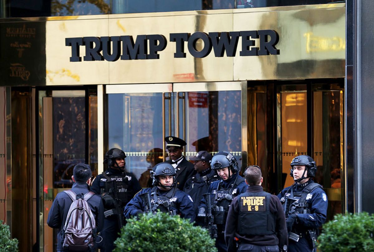 In this Nov. 17, 2016 file photo, security personnel stand at the front entrance of Trump Tower in New York. The Trump administration is asking for more money to protect President Donald Trump’s signature New York skyscraper, add hundreds of new Secret Service agents and beef up security at the White House, according to new budget documents presented to Congress. (AP Photo/Seth Wenig)