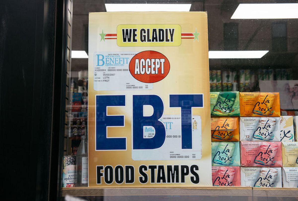 A sign alerting customers about SNAP food stamps benefits is displayed at a Brooklyn grocery store on December 5, 2019 in New York City, United States. (Photo by Scott Heins/Getty Images)