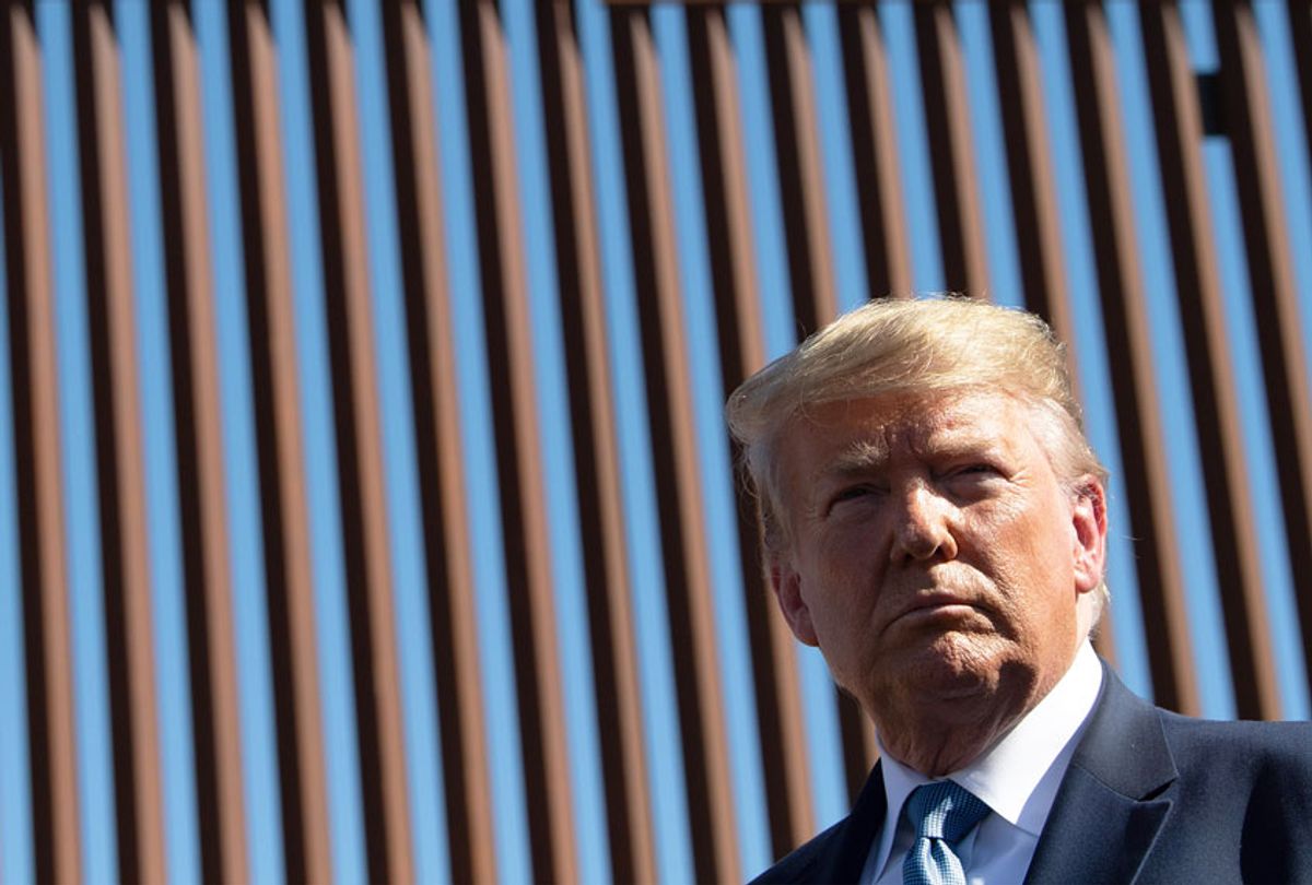 US President Donald Trump visits the US-Mexico border fence in Otay Mesa, California on September 18, 2019. (NICHOLAS KAMM/AFP via Getty Images)