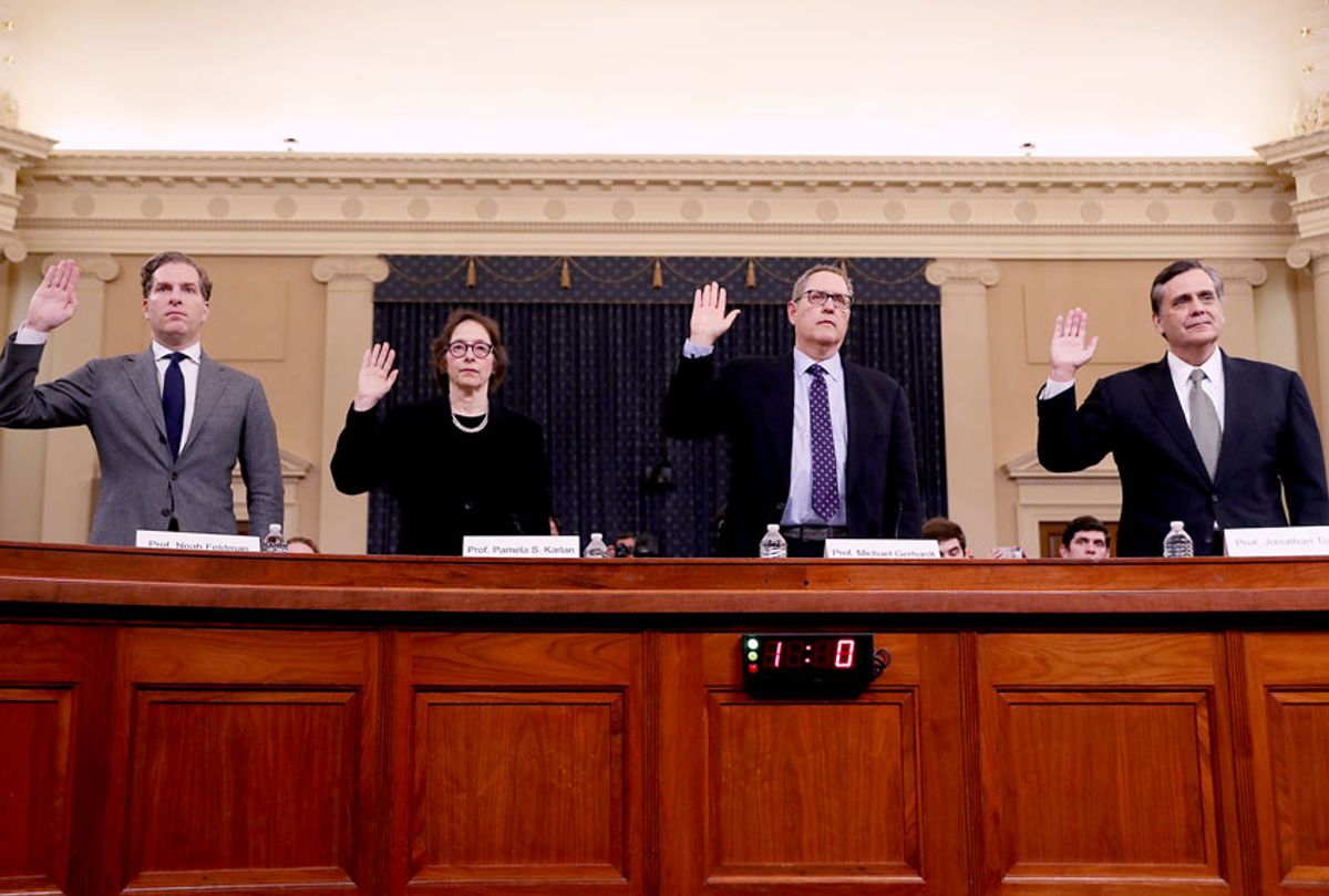 Constitutional scholars Noah Feldman of Harvard University, Pamela Karlan of Stanford University, Michael Gerhardt of the University of North Carolina, and Jonathan Turley of George Washington University are sworn in to testify before the House Judiciary Committee in the Longworth House Office Building on Capitol Hill December 4, 2019 in Washington, DC. This is the first hearing held by the Judiciary Committee in the impeachment inquiry against U.S. President Donald Trump, whom House Democrats say held back military aid for Ukraine while demanding it investigate his political rivals. The Judiciary Committee will decide whether to draft official articles of impeachment against President Trump to be voted on by the full House of Representatives. (Chip Somodevilla/Getty Images)