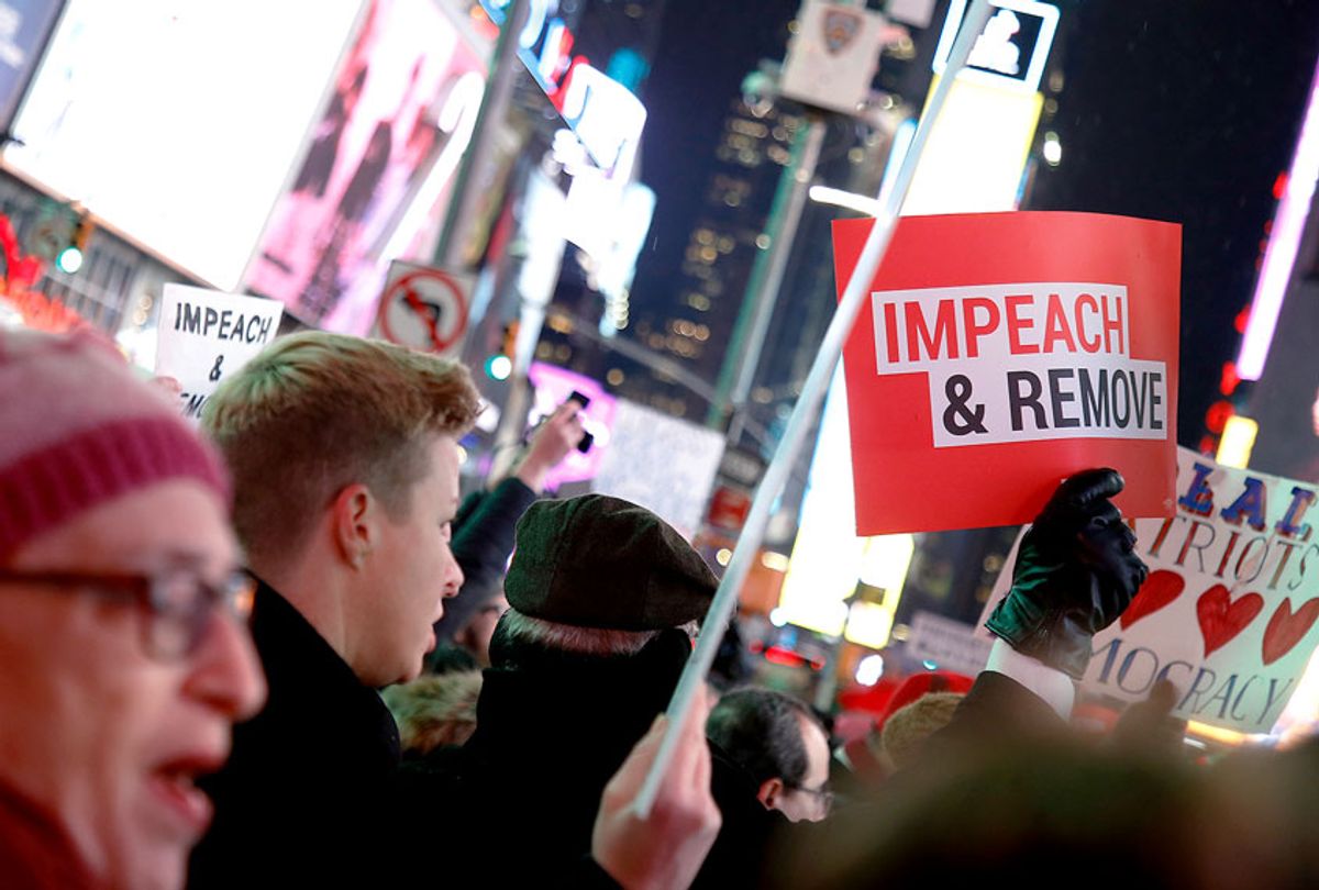 Demonstrators join national impeachment demonstrations to demand an end to Donald Trump's presidency named "Nobody Is Above The Law" Rally - NYC at Times Square on December 17, 2019 in New York City. (John Lamparski/Getty Images for MoveOn.org)
