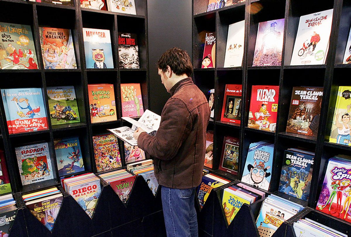 A man reads a comic book at the International Comics Festival in Angouleme southern France. (PIERRE ANDRIEU/AFP via Getty Images)