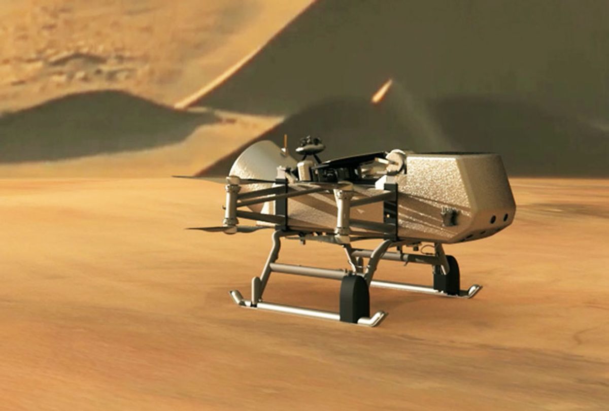 This illustration shows NASA’s Dragonfly rotorcraft-lander approaching a site on Saturn’s exotic moon, Titan. Taking advantage of Titan’s dense atmosphere and low gravity, Dragonfly will explore dozens of locations across the icy world, sampling and measuring the compositions of Titan's organic surface materials to characterize the habitability of Titan’s environment and investigate the progression of prebiotic chemistry. (NASA/JHU-APL)