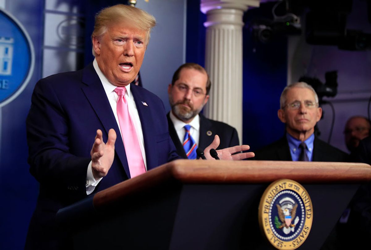 President Donald Trump, with members of the president's coronavirus task force, speaks during a news conference in the Brady press briefing room at the White House, Wednesday, Feb. 26, 2020, in Washington. (AP Photo/Manuel Balce Ceneta)