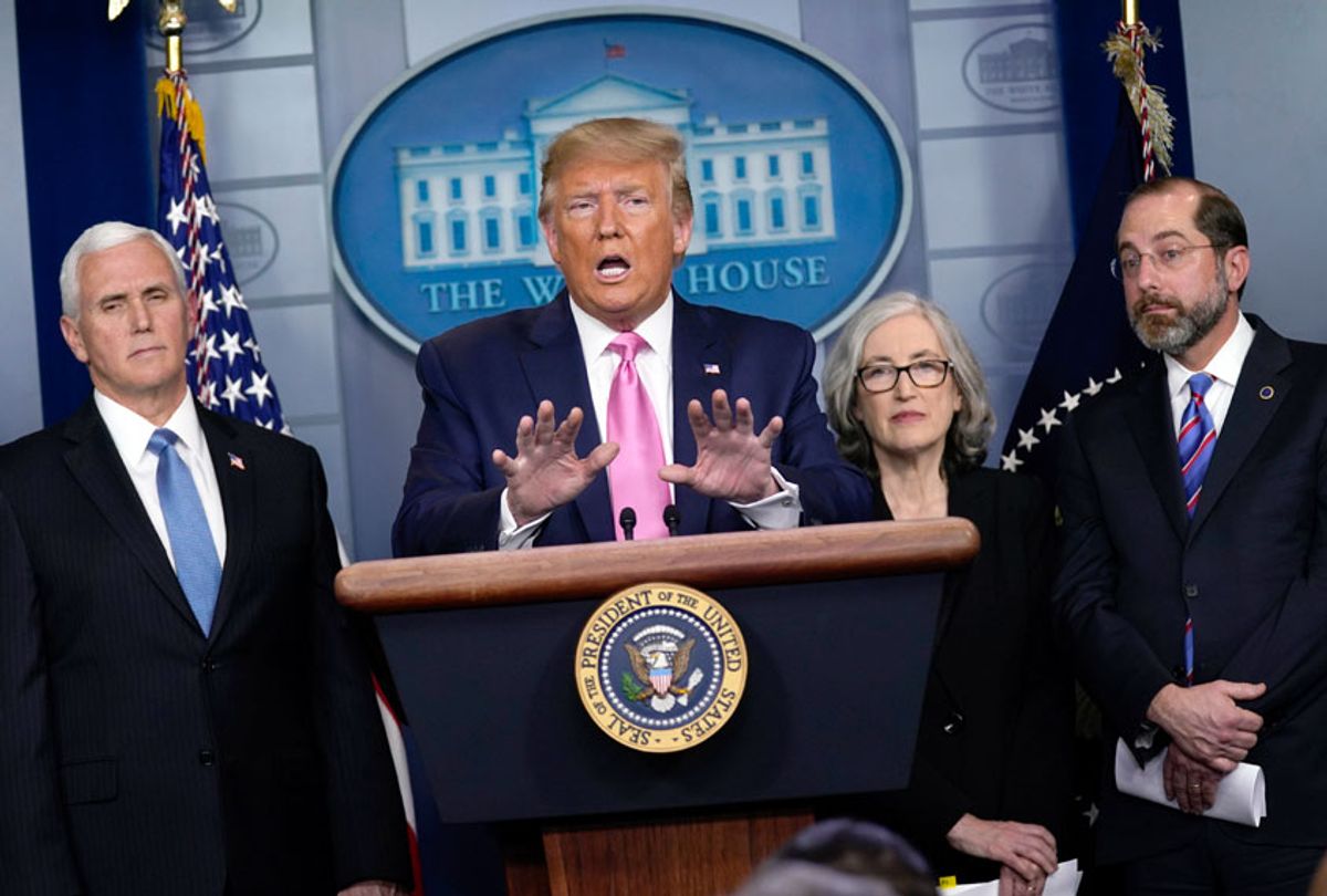 President Donald Trump, with members of the president's coronavirus task force, speaks during a news conference in the Brady Press Briefing Room of the White House, Wednesday, Feb. 26, 2020, in Washington.  (AP Photo/Evan Vucci)