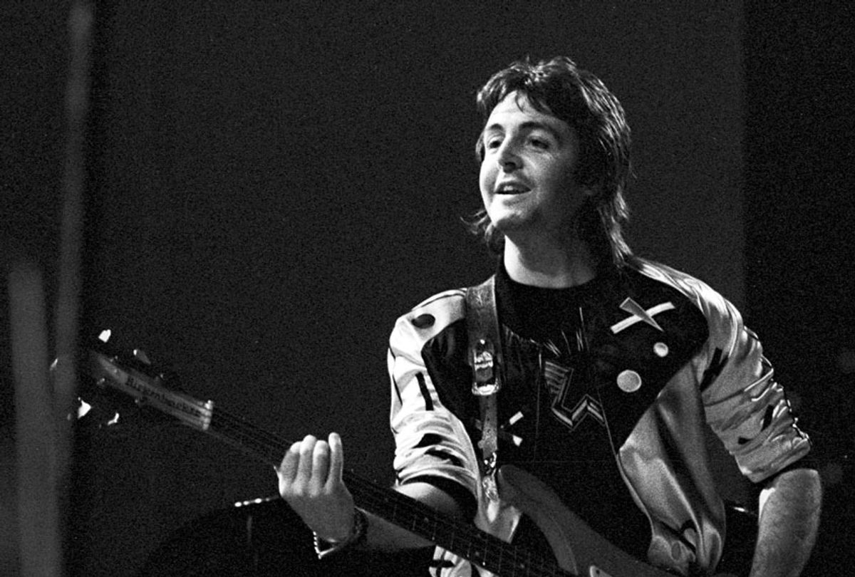  Paul McCartney performs live on stage with Wings at Ahoy in Rotterdam, Netherlands on March 25th 1976.  (Gijsbert Hanekroot/Redferns/Getty Images)