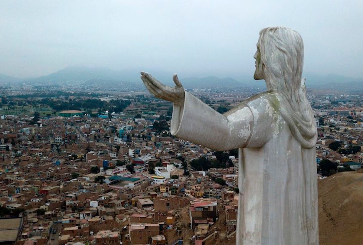 View of the "Christ of the Pacific" statue atop a hill in Lima, on July 15, 2019. The giant statute of Jesus Christ that looms large over Lima has caused controversy in Peru because of its financing by the graft-tainted Brazilian construction giant Odebrecht and late ex-president Alan Garcia.  (Cris Bouroncle/AFP via Getty Images)