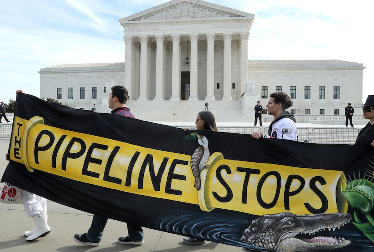 Climate activist groups protest in front of the U.S. Supreme Court as oral arguments are heard in U.S. Forest Service and Atlantic Coast Pipeline, LLC v. Cowpasture River Assn. case, on February 24, 2020 in Washington, DC. (Mark Wilson/Getty Images)