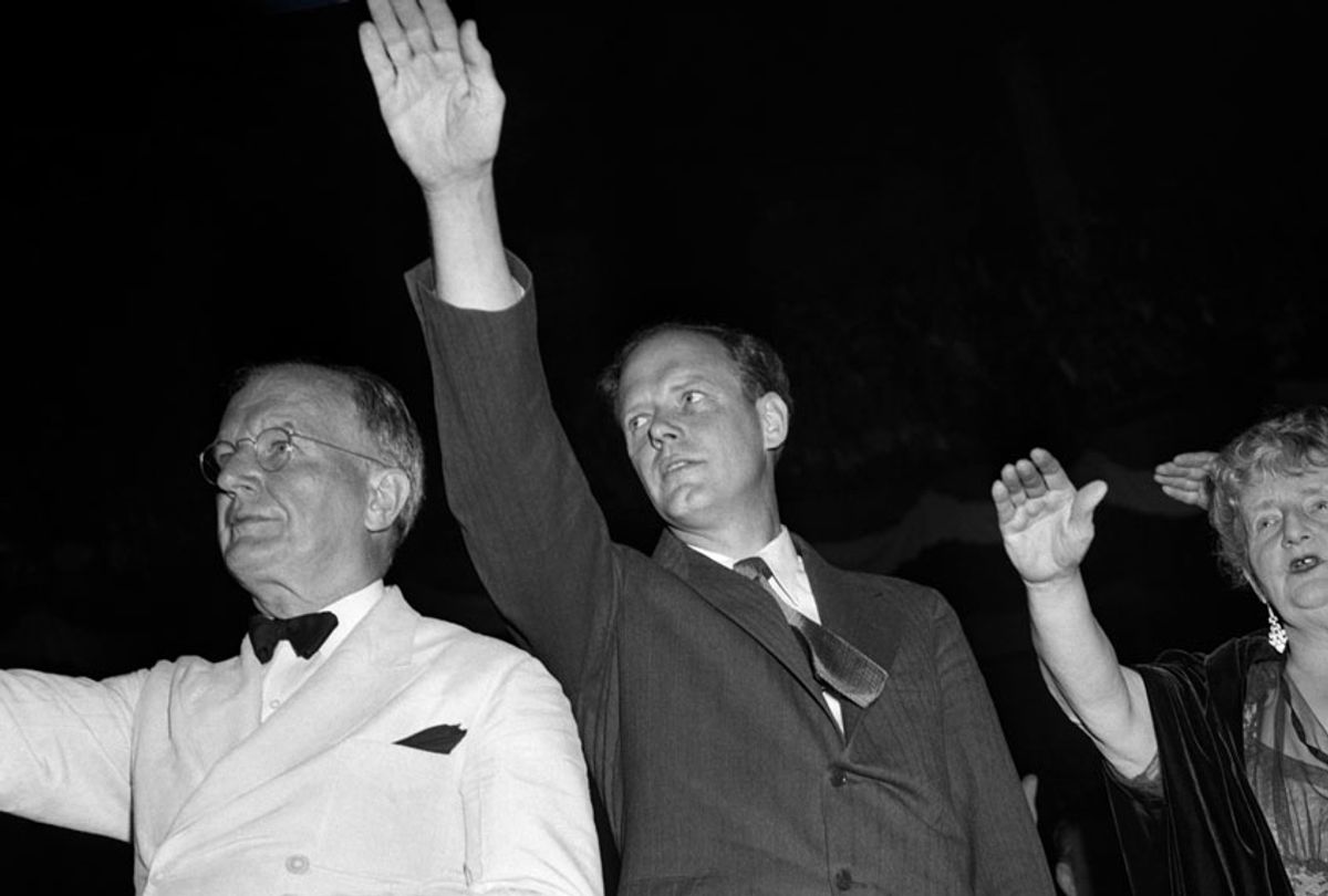 Charles Lindbergh (1902-1974) the spokesperson for the America First Committee (AFC) giving the Nazi arm salute during a rally on October 30, 1941 (Irving Haberman/IH Images/Getty Images)