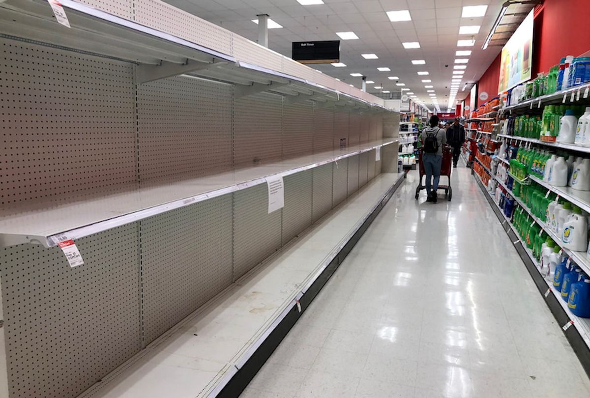 Empty shelves are visible at a Target store on March 13, 2020 in San Rafael, California. (Justin Sullivan/Getty Images)