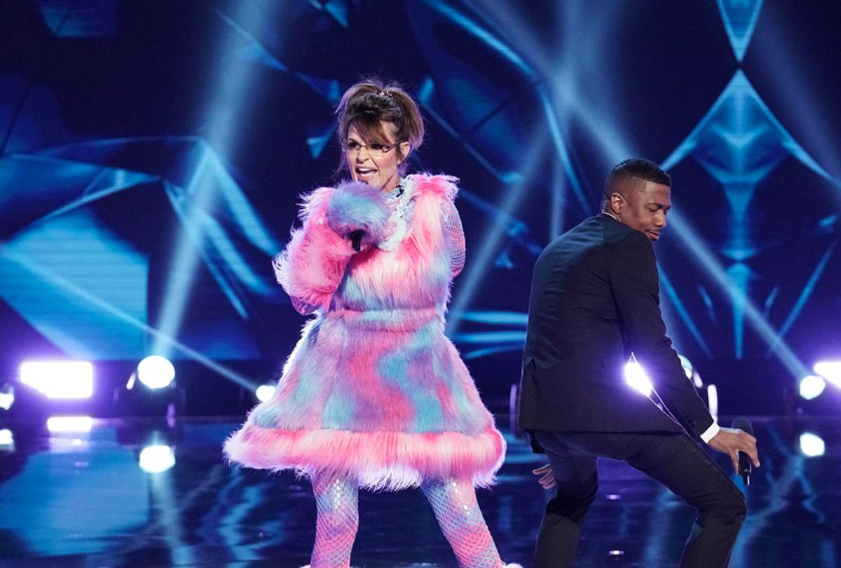 THE MASKED SINGER: L-R: Sarah Palin and Host Nick Cannon in the “Last But Not Least: Group C Kickoff!” episode of THE MASKED SINGER airing Wednesday, March 11 (8:00-9:01 PM ET/PT) on FOX. (Michael Becker / FOX. © FOX Media LLC.)