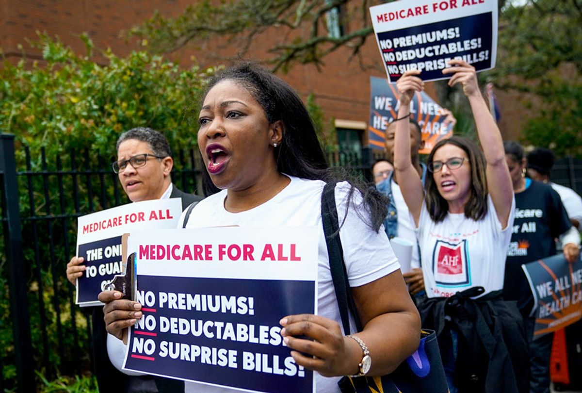 Supporters of "Medicare For All" demonstrate outside of the Charleston Gaillard Center ahead of the Democratic presidential debate on February 25, 2020 in Charleston, South Carolina. South Carolina holds its Democratic presidential primary on Saturday, February 29.  (Drew Angerer/Getty Images)