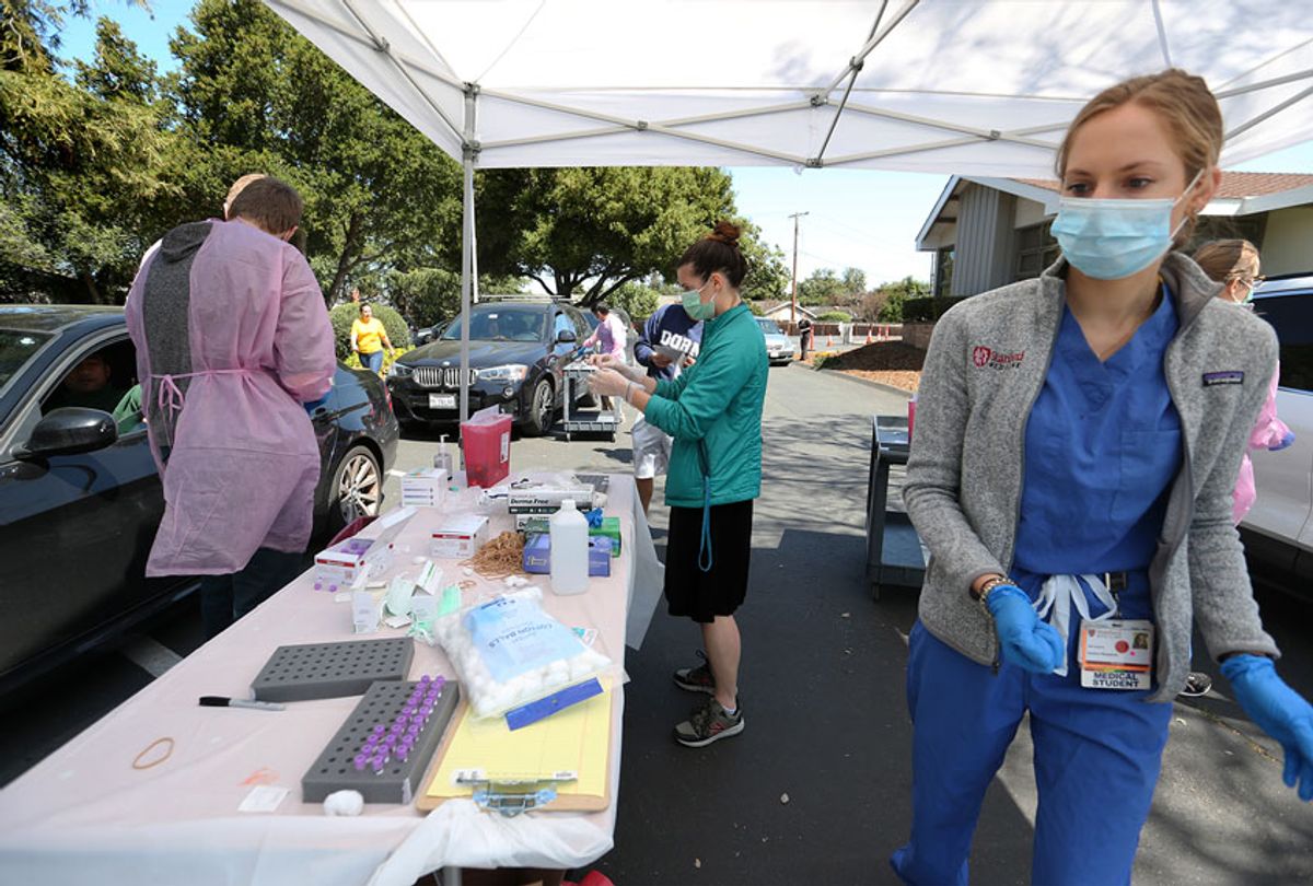 Medical students, faculty and volunteers take blood samples during a coronavirus antibody study at Mountain View's First Presbyterian Church in Mountain View, Calif. (Ray Chavez/MediaNews Group/The Mercury News/Getty Images)
