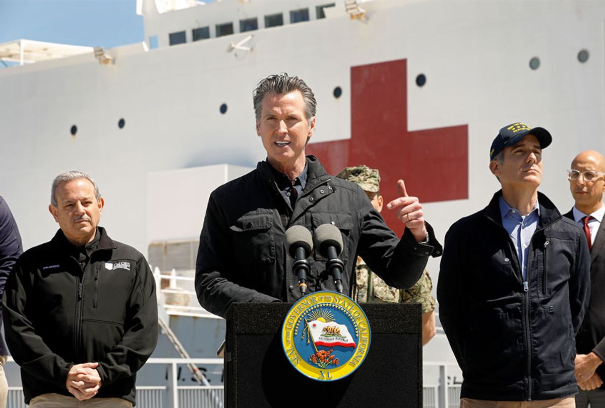 California Governor Gavin Newsom speaks in front of the hospital ship USNS Mercy (Carolyn Cole-Pool/Getty Images)