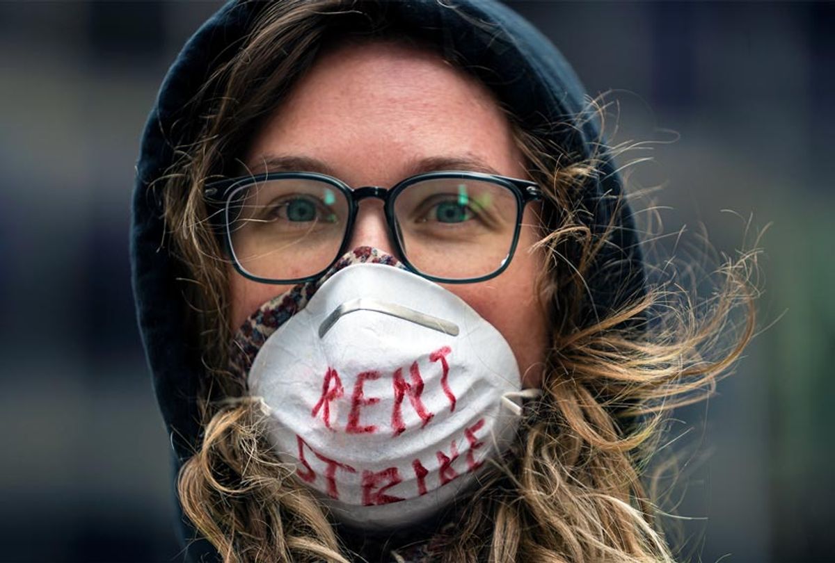 Tenant right advocates including Karissa Stotts organized a honking, vehicle protest around the US Bank building. (Richard Tsong-Taatarii/Star Tribune via Getty Images)
