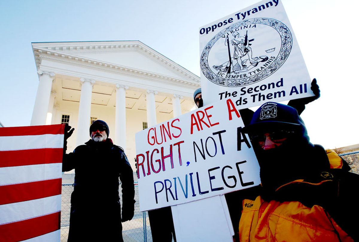 Gun-rights supporters demonstrate in front of state Capitol in Richmond, Va. (AP Photo/Steve Helber))