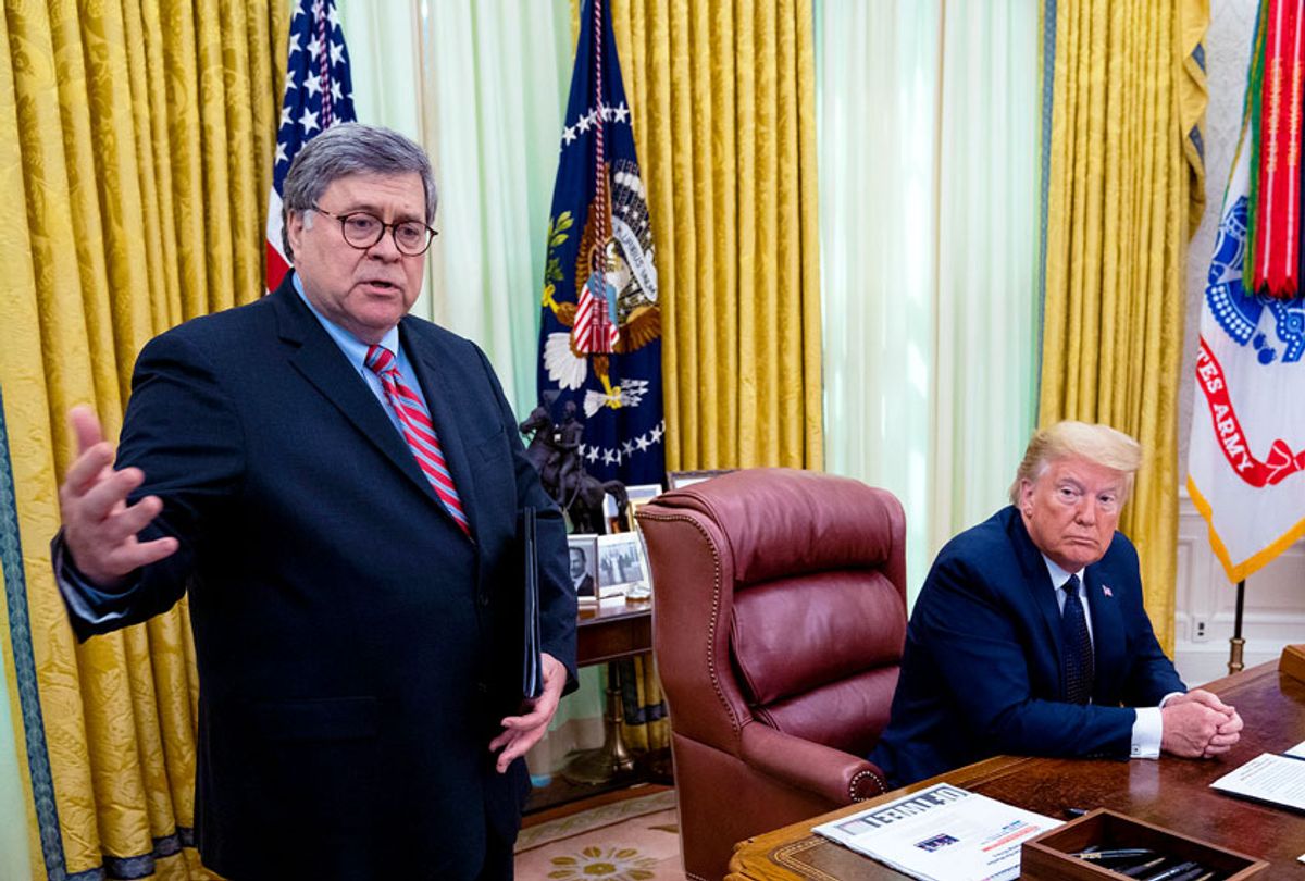 U.S. President Donald Trump and Attorney General William Barr speak in the Oval Office before signing an executive order related to regulating social media (Doug MIlls-Pool/Getty Images)