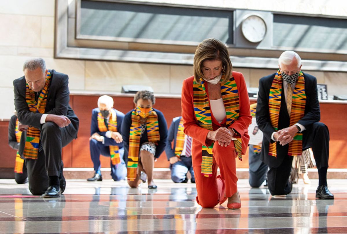 Speaker of the House Nancy Pelosi, D-Calif., and other members of Congress gather at the Emancipation Hall, kneel as they take moment of silence to honor George Floyd, and victims of racial injustice on Monday, June 8, 2020. (Caroline Brehman/CQ-Roll Call, Inc via Getty Image)