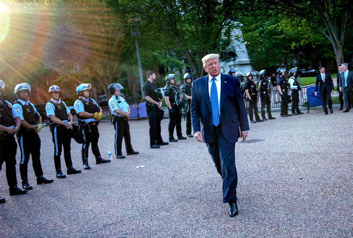 US President Donald Trump leaves the White House on foot to go to St John's Episcopal church across Lafayette Park in Washington, DC on June 1, 2020 (BRENDAN SMIALOWSKI/AFP via Getty Images)