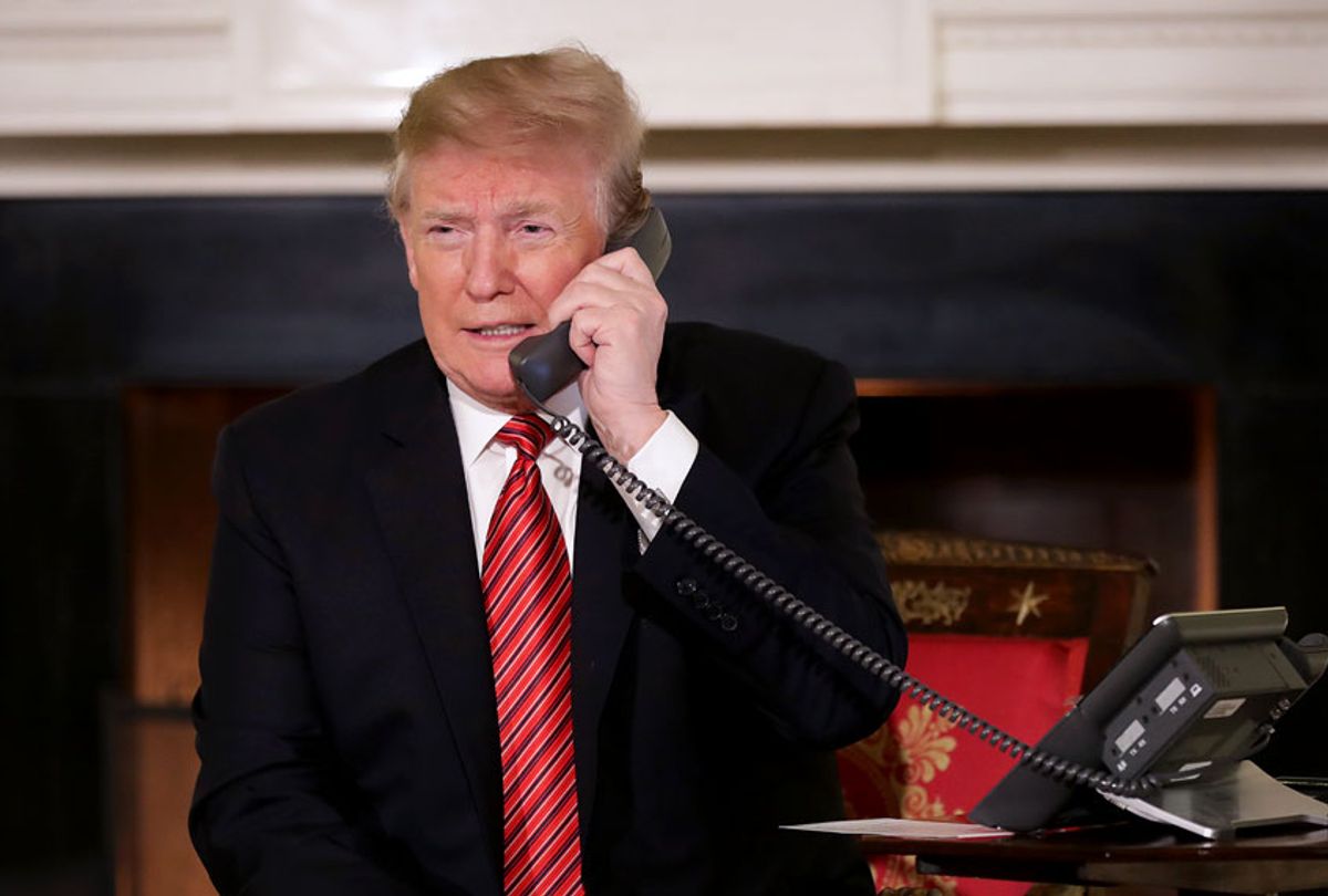 U.S. President Donald Trump takes a phone call (Chip Somodevilla/Getty Images)