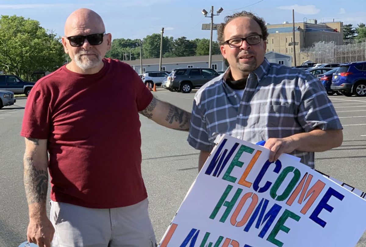 Lawrence Bell [right], moments after being released from East Jersey State Prison on Sunday, is greeted by his friend Ron Pierce [left], who was also incarcerated for three decades. (Photo taken by Chris Hedges)