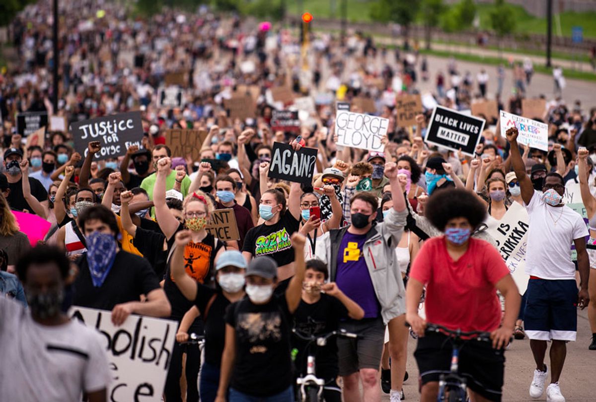 Protesters march on Hiawatha Avenue while decrying the killing of George Floyd on May 26, 2020 in Minneapolis, Minnesota (Stephen Maturen/Getty Images)