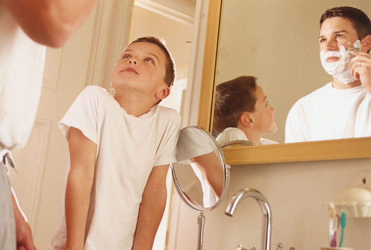 Boy Watching Father Shaving (Getty Images)