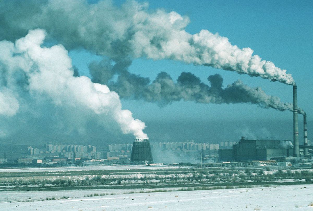 Factory chimneys spewing smoke and pollution into the atmosphere on the outskirts of Ulan Bator (Peter Charlesworth/LightRocket via Getty Images)
