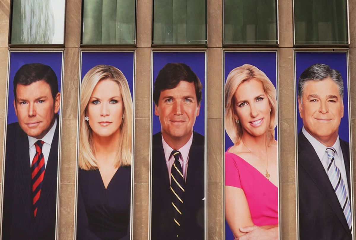 Advertisements featuring Fox News personalities, including Bret Baier, Martha MacCallum, Tucker Carlson, Laura Ingraham, and Sean Hannity, adorn the front of the News Corporation building, (Getty Images/Drew Angerer/Getty Images)