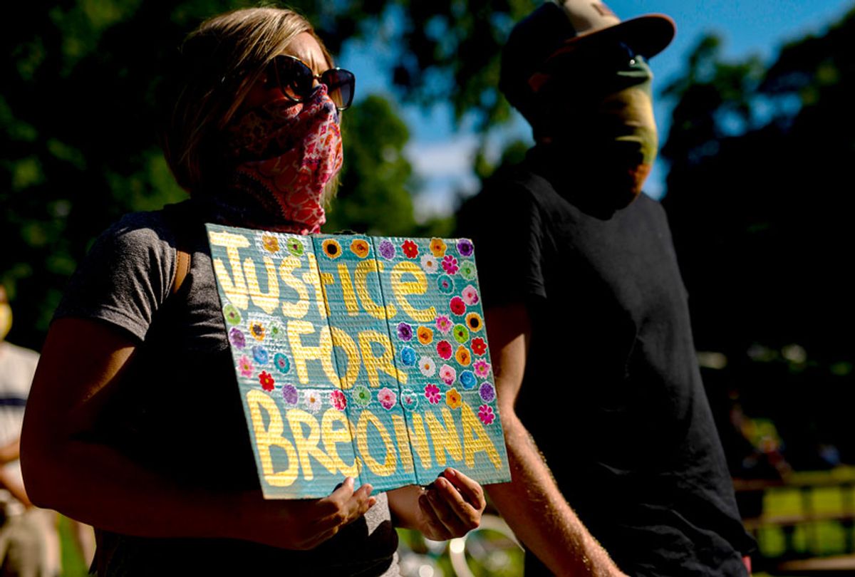People gather in Powderhorn Park before a march honoring Breonna Taylor on June 26, 2020 in Minneapolis, Minnesota. Taylor was shot and killed by members of the Louisville Metro Police Department on March 13, 2020. (Stephen Maturen/Getty Images)