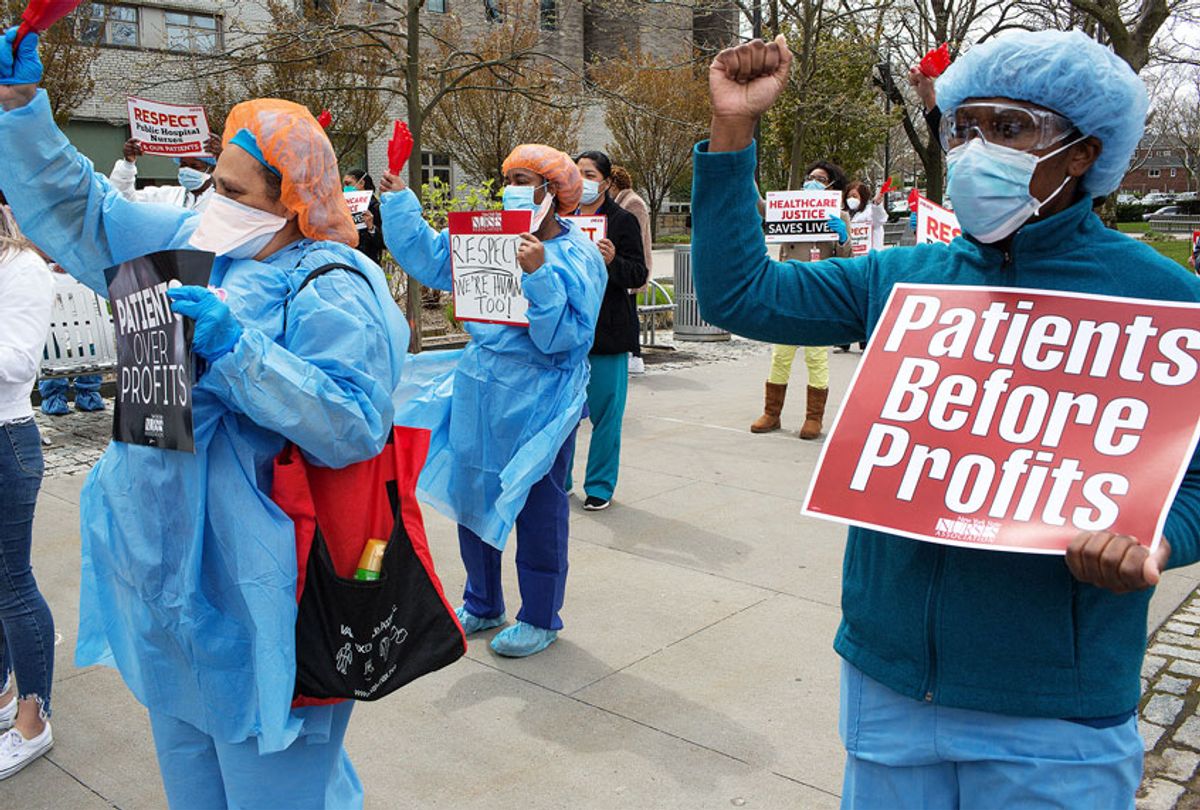 New York City nurses and other hospital professionals protest dangerous working conditions and a change in sick leave policies during the COVID-19 pandemic (Andrew Lichtenstein/Corbis via Getty Images)