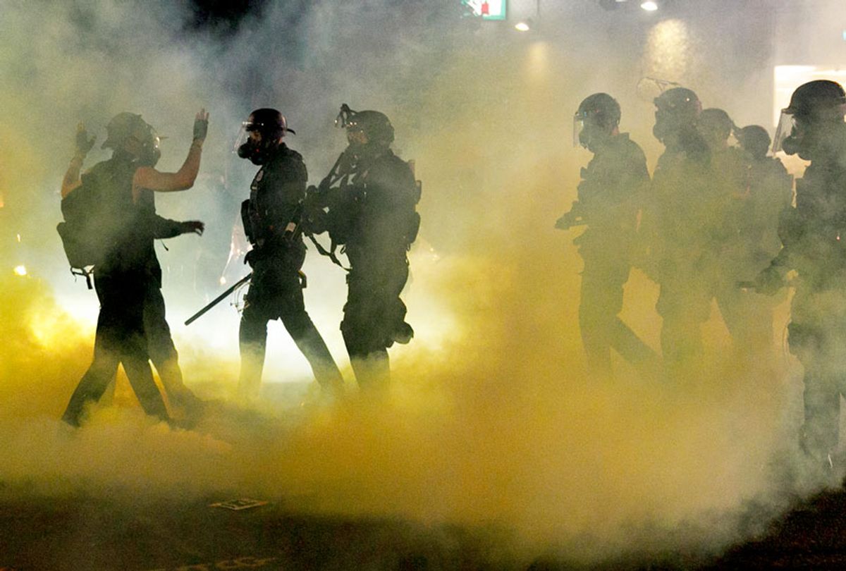 Police confront Black Lives Matter demonstrators in Portland, Oregon. (John Rudoff/Anadolu Agency via Getty Images)