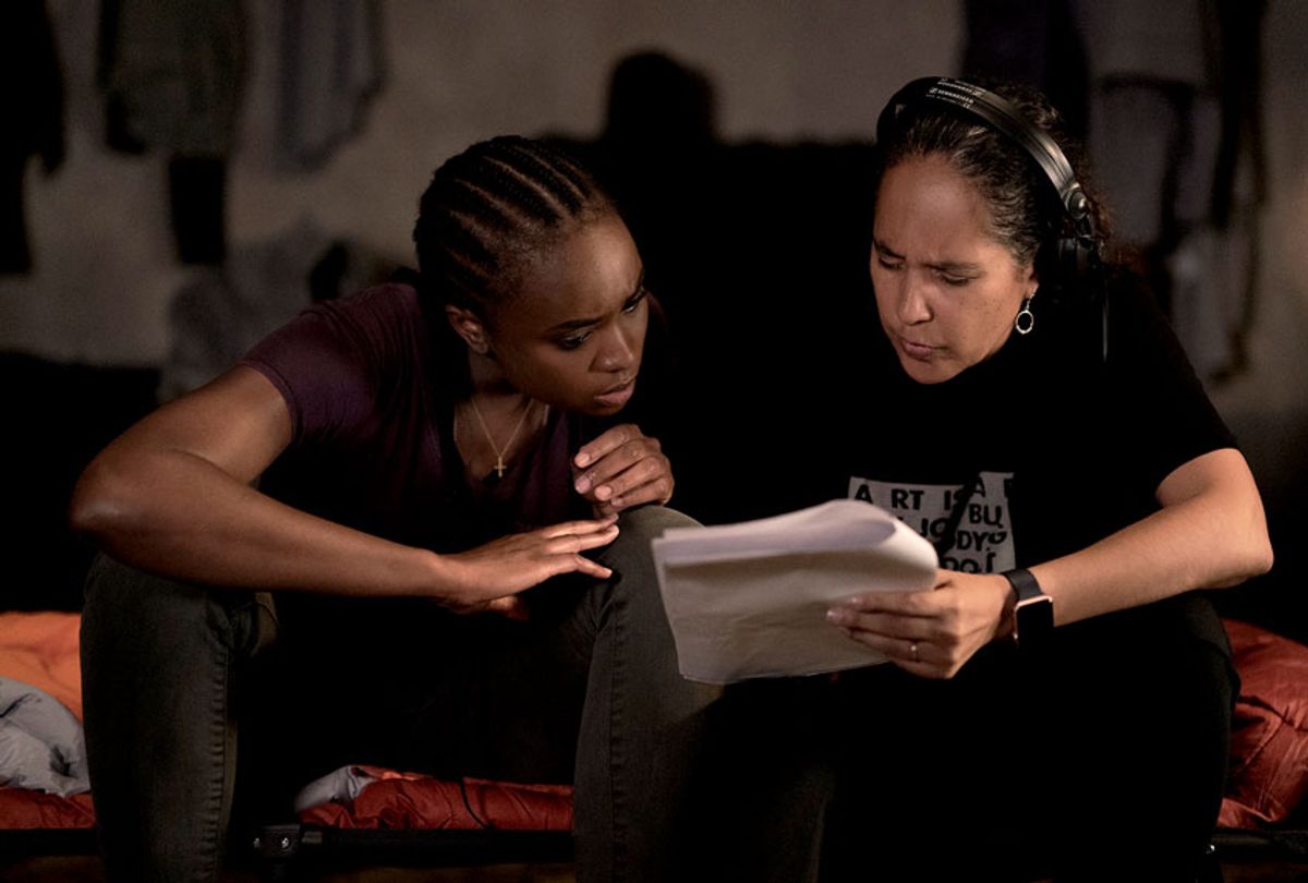 "The Old Guard" behind-the-scenes shot of actress Kiki Layne, and Director Gina Prince-Bythewood (Aimee Spinks/Netflix)