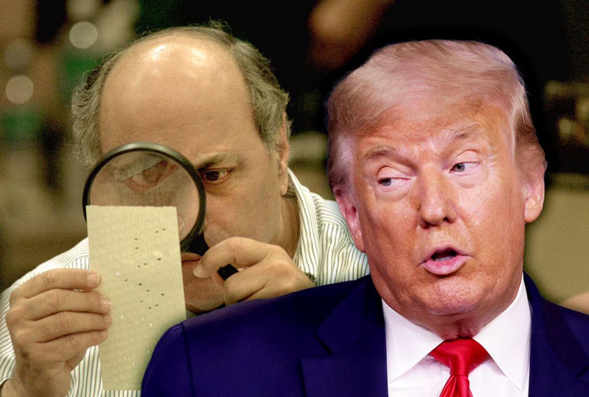 U.S. President Donald Trump | Judge Robert Rosenberg of the Broward County Canvassing Board uses a magnifying glass to examine a dimpled chad on a punch card ballot November 24, 2000 during a vote recount in Fort Lauderdale, Florida. (Getty Images/Salon)