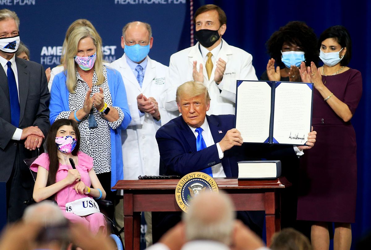 U.S. President Donald Trump reacts after signing an executive order following his remarks on his healthcare policies on September 24, 2020 in Charlotte, North Carolina. Trump's trip to North Carolina marks his fifth time in the state within the last 30 days. (Brian Blanco/Getty Images)