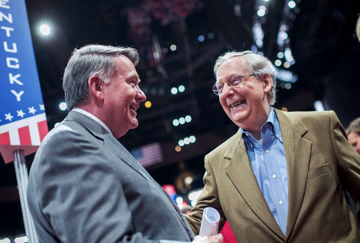 Senate Majority Leader Mitch McConnell, R-Ky., and Mike Duncan, former chairman of the Republican National Committee, talk on the floor of the Quicken Loans Arena in Cleveland, Ohio, a day before the start of the Republican National Convention, July 17, 2016. (Tom Williams/CQ Roll Call)