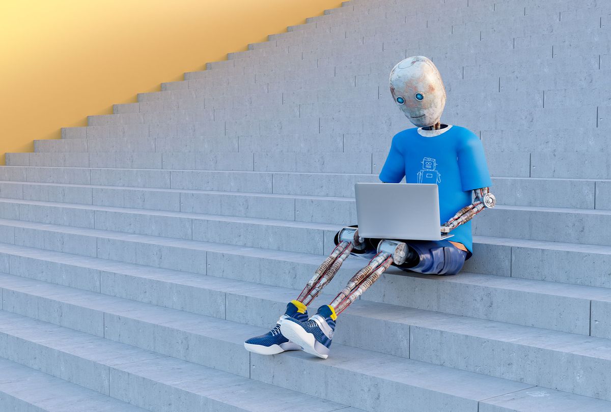 Robot sitting on stairs using laptop (Getty Images)