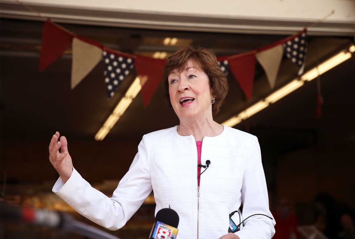 U.S. Sen. Susan Collins talks to reporters during a campaign stop at Blackie's Farm Fresh Produce on Thursday. (Ben McCanna/Portland Press Herald via Getty Images)
