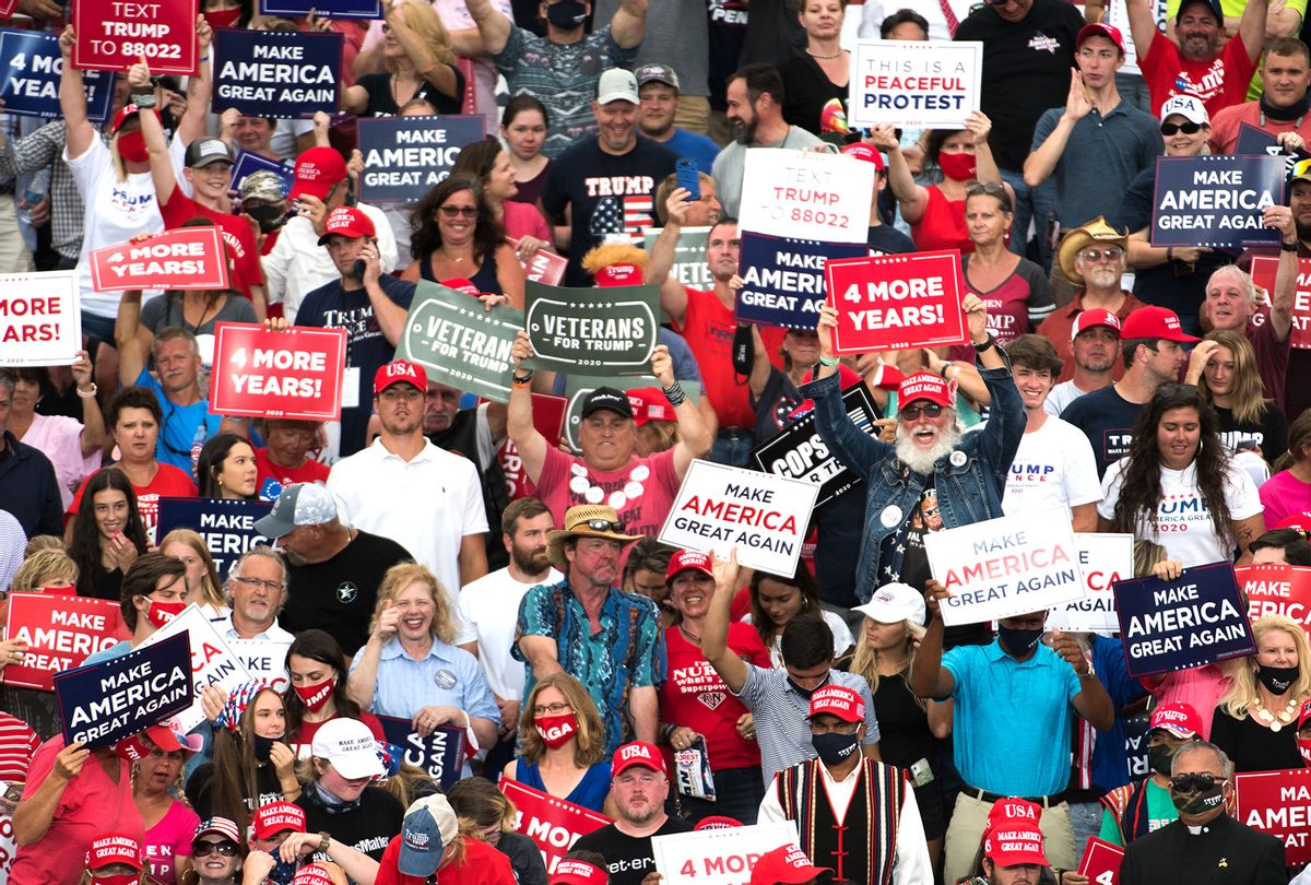 People cheer for President Donald Trump during a campaign rally at Smith Reynolds Airport on September 8, 2020 in Winston Salem, North Carolina. The president also made a campaign stop in South Florida on Tuesday. (Sean Rayford/Getty Images)