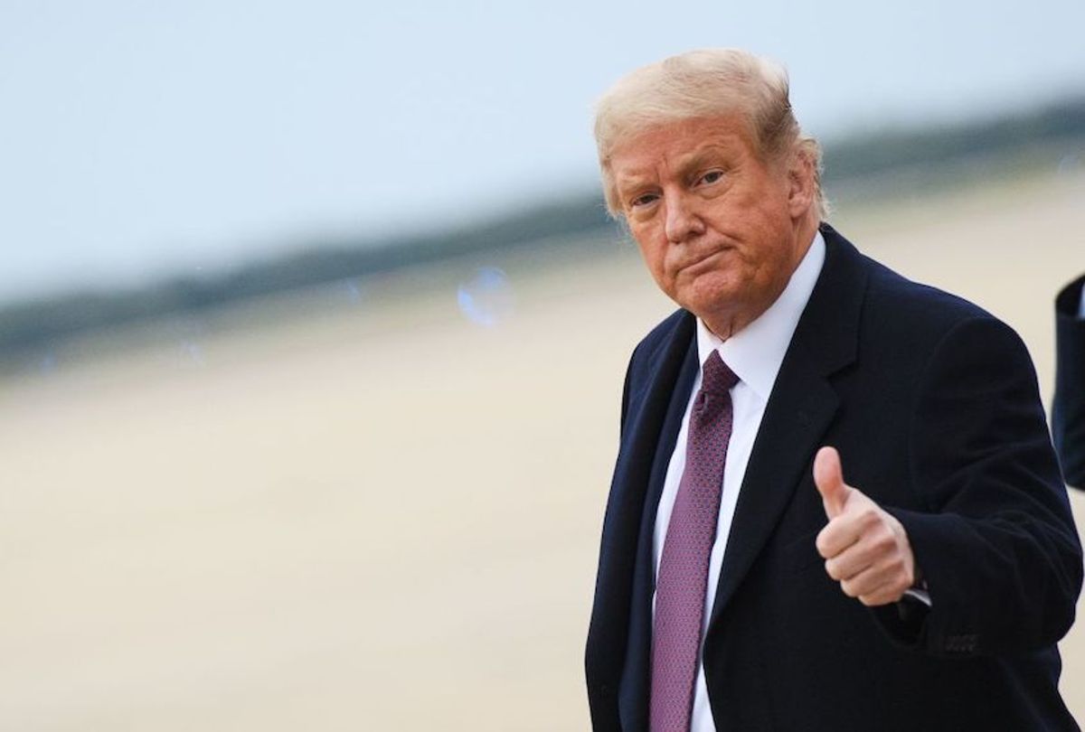 US President Donald Trump gives a thumbs up as he steps off Air Force One upon arrival at Andrews Air Force Base in Maryland on October 1, 2020. (Photo by MANDEL NGAN/AFP via Getty Images)