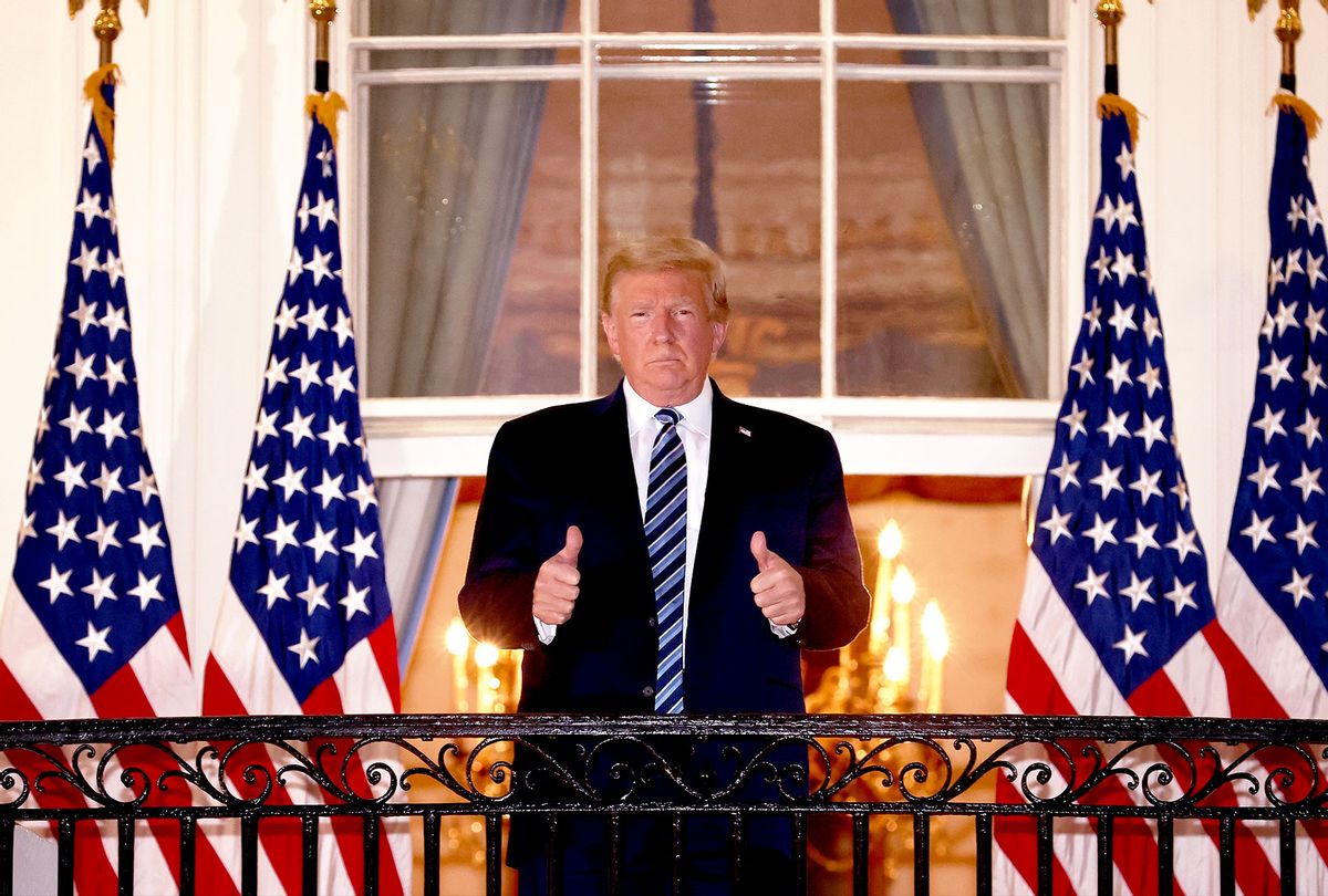 U.S. President Donald Trump gives a thumbs up upon returning to the White House from Walter Reed National Military Medical Center on October 05, 2020 in Washington, DC. Trump spent three days hospitalized for coronavirus. (Win McNamee/Getty Images)