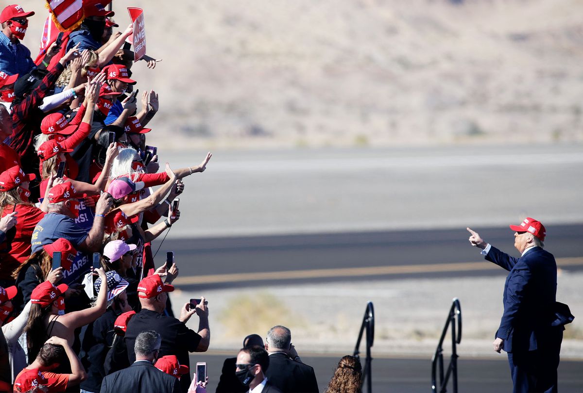 U.S. President Donald Trump gestures to supporters following a campaign rally on October 28, 2020 in Bullhead City, Arizona. (Isaac Brekken/Getty Images)