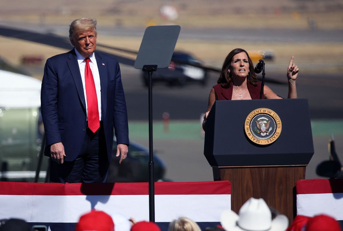 U.S. President Donald Trump watches as Senator Martha McSally (R-AZ) speaks at a Make America Great Again campaign rally on October 19, 2020 in Prescott, Arizona. (Caitlin O'Hara/Getty Images)