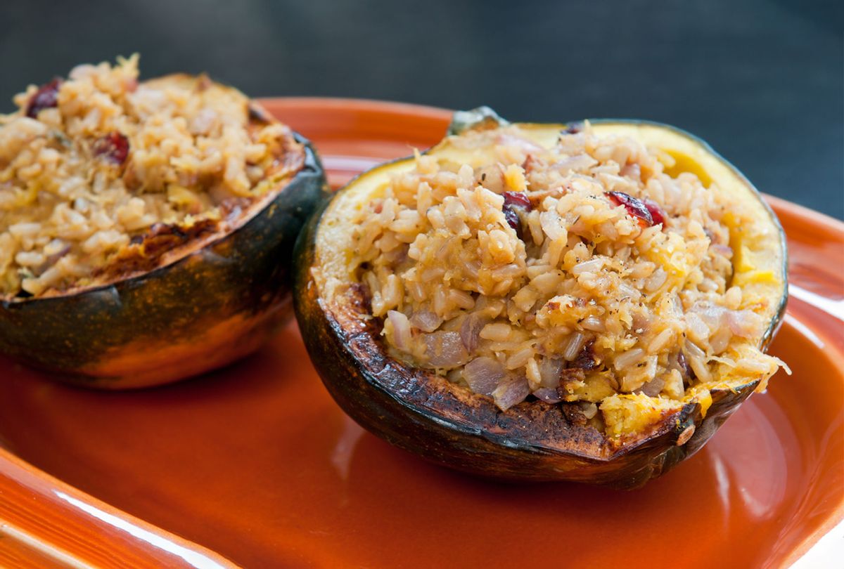 Two acorn squash halves stuffed with stuffing (Getty Images)