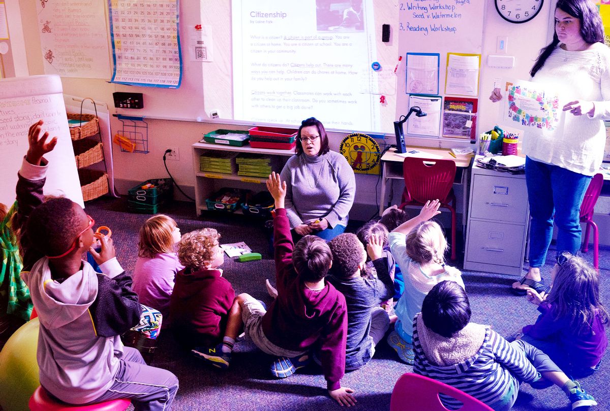 Teachers, Erin Kelly, left, and Dana Lespierre, lead a second grade class in a lesson teaching good citizenship. At Burgundy Farm Country Day School in Alexandria, Virginia, teachers are using the presidential election to educate students about things such as citizenship and character traits. With the issues surrounding the 2016 election, some teachers have avoided discussing the election altogether, while others have assigned students to watch the debates. ( (Sarah L. Voisin/The Washington Post via Getty Images)