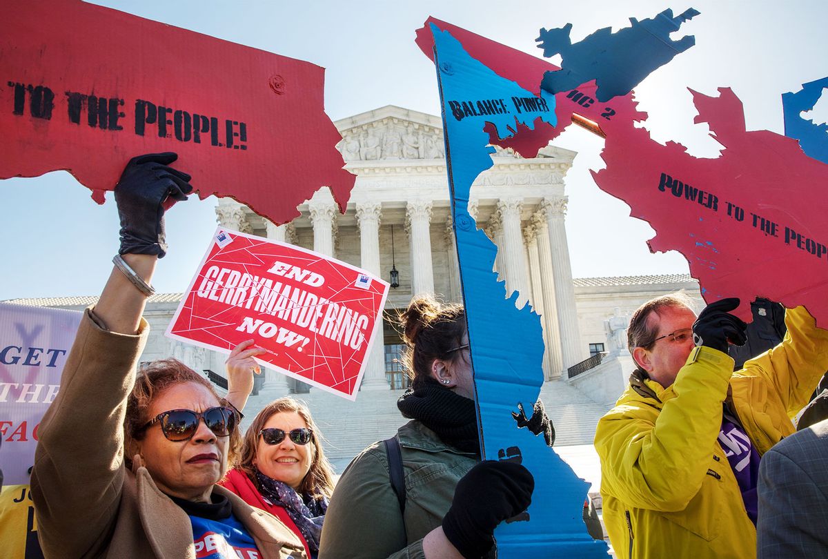 Demonstrators protest against gerrymandering at a rally at the Supreme Court during the gerrymandering cases Lamone v. Benisek and Rucho v. Common Cause. (Evelyn Hockstein/For The Washington Post via Getty Images)