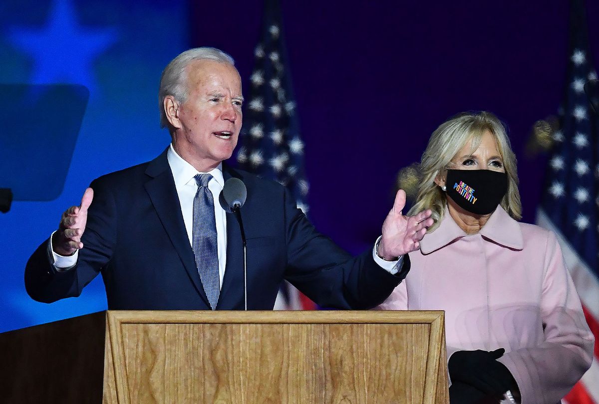 Democratic presidential nominee Joe Biden along with his wife Jill Biden speaks during election night at the Chase Center in Wilmington, Delaware, early on November 4, 2020. (ANGELA WEISS/AFP via Getty Images)