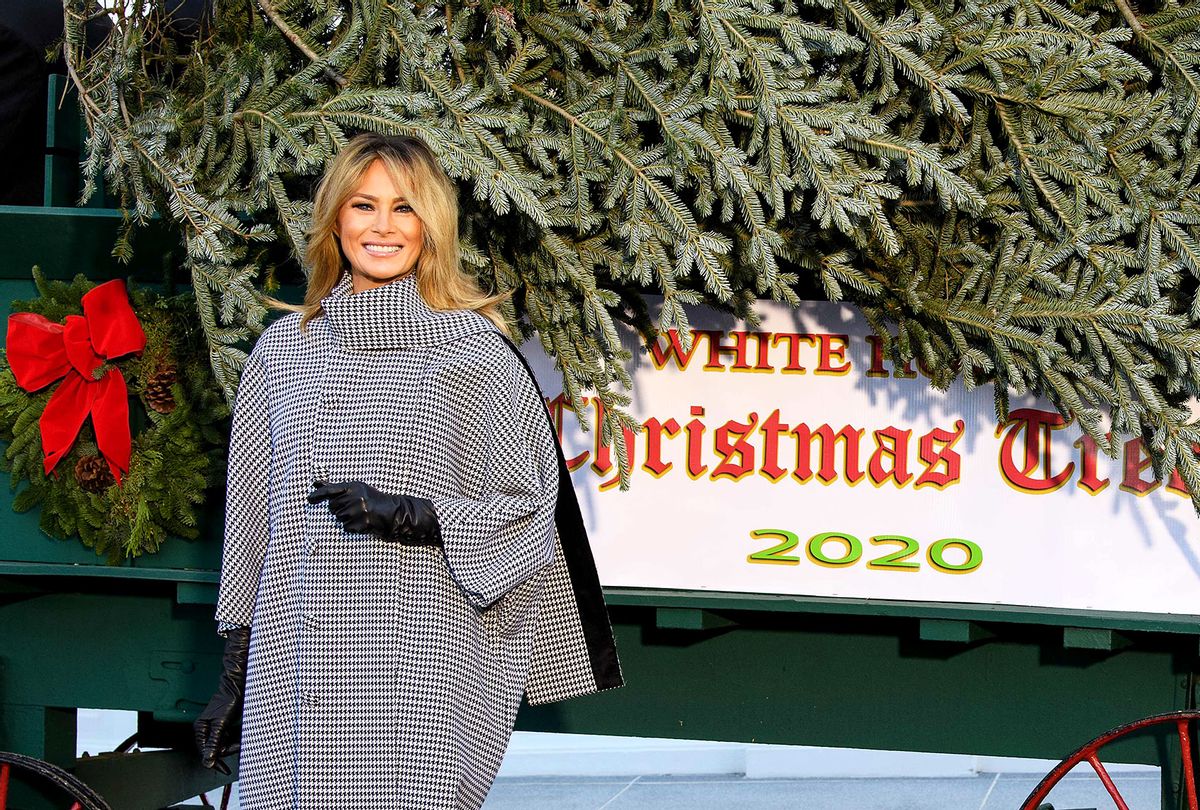 US First Lady Melania Trump receives the White House Christmas Tree at the White House in Washington, DC, on November 23, 2020. (NICHOLAS KAMM/AFP via Getty Images)