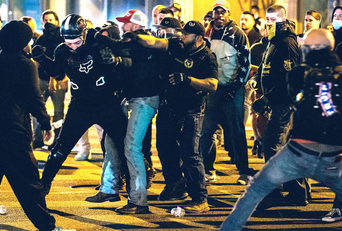 Members of Antifa and Proud Boys clash in the middle of the street following the "Million MAGA March" on November 14, 2020 in Washington, DC. Various pro-Trump groups gathered in DC today for the "Million MAGA March" to protest the results of the 2020 presidential election. (Samuel Corum/Getty Images)