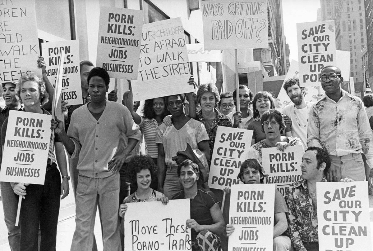 A group of anti pornography activists holding placards pose together during a protest in New York City, US, 1977. (Keystone/Getty Images)